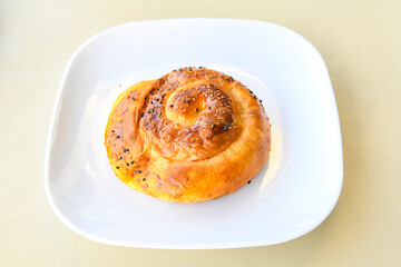 Turkish style meat stuffed filo dough borek served kol boregi. Cheese and minced pie are sliced on a marble background. Turkish name: Kol Boregi, ispanakli, kiymali, Su Boregi