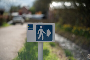 pedestrian road sign on street, parking, transportation concept