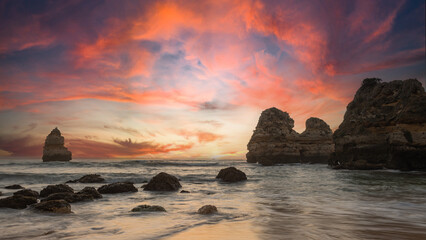 sunset on the beach - travel concept, praia do camilo near Lagos, portugal