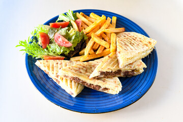 Turkish karisik atom Ayvalik tost ( kasarli bazlama tost) . Sucuklu, Kasarli, kavurmali karisik tost. Flat baked bread toasted