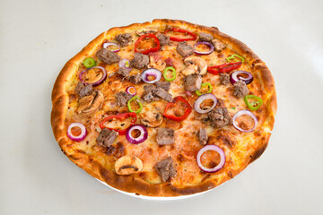 Delicious mixed pizza with rich content. Menu concept of choice and diversity. Karisik pizza