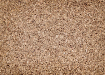 Surface texture of decorative cork panel, background.