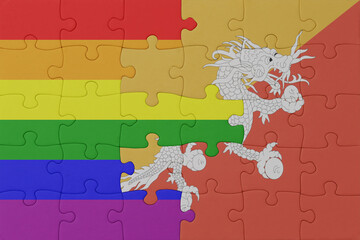 puzzle with the flag of rainbow gay pride and bhutan . macro.concept.