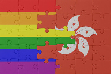 puzzle with the flag of rainbow gay pride and hong kong . macro.concept.