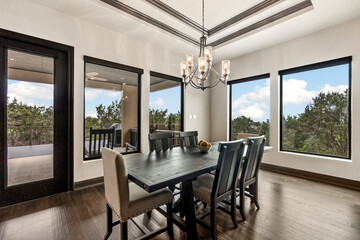 home dining room with large windows 