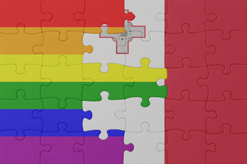 puzzle with the flag of rainbow gay pride and malta . macro.concept.