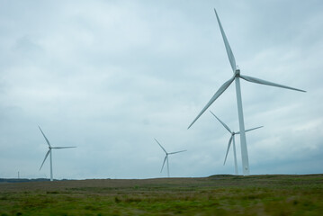 Wind turbine farm in a field in Scotland © Jennifer