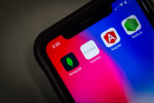 Vancouver, CANADA - Mar 29 2023 : MEAN stack (MongoDB, Express.js, Angular and Node.js) icons seen in an iPhone. MEAN is an OSS JavaScript software stack for building dynamic web sites and web apps