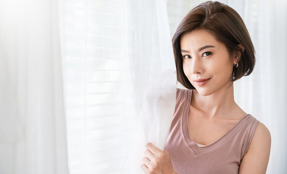 Portrait of young beautiful sexy asian korean woman slim fit body. Isolated, fashion asian girl looking. Lifestyle japanese makeup, korea people glow with curtain, beauty girl next door.