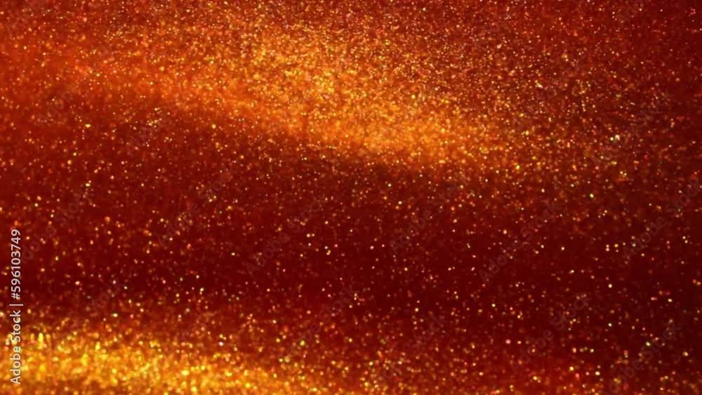 Canvas Prints overflowing and dispersion of gold particles jets in red liquid. gold dust particles floating and fl