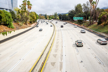 Traffic on a freeway in Los Angels on a sunny autumn day