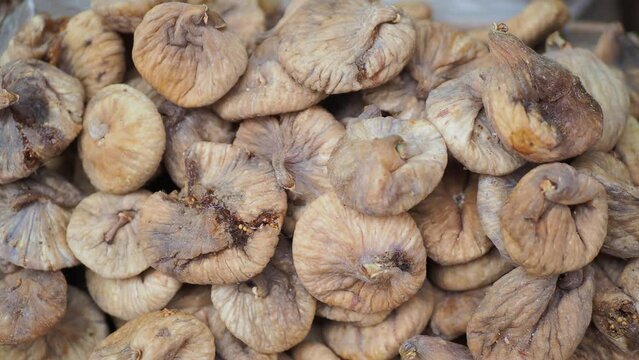 Dried fig fruit on on a plate on table 