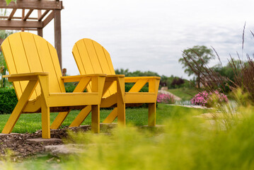 wooden chairs at the park