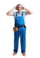Mature carpenter in hearing protectors on white background