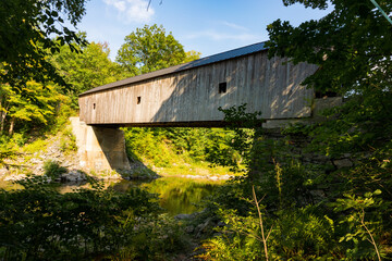 Old Road Bridge building over river