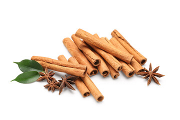 Cinnamon sticks with leaves and anise on white background