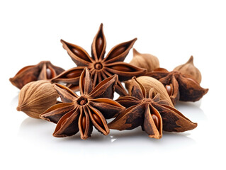A bunch of star anise seeds on a white background