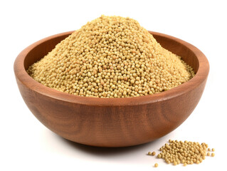 A pile of yellow mustard seeds on a white background