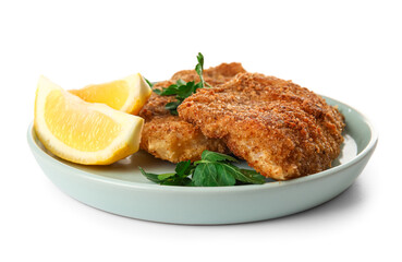 Plate of tasty fried codfish with lemon on white background