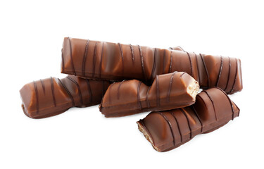 Pieces of tasty chocolate bars on white background