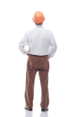 architect in a protective helmet striding forward . isolated on a white