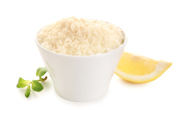 Bowl with tasty grated Parmesan cheese on white background