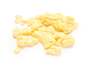 Tasty scrambled eggs on white background
