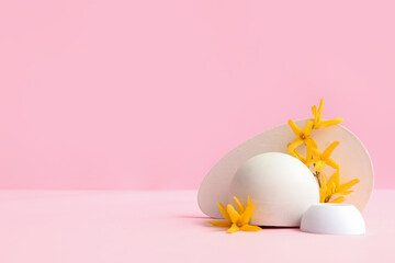 Decorative podiums and beautiful flowers on pink background