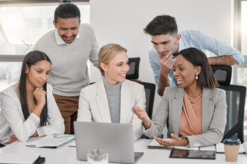 Cooperation is the thorough conviction. a group of colleagues having a discussion in a office.