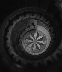 Fototapeta na wymiar compass on a black background stairs black and white 