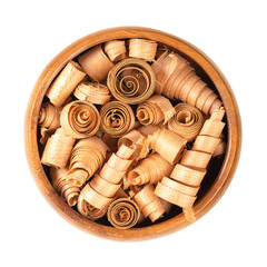 Spiral shaped wood shavings of Swiss pine wood, in a wooden bowl. Pinus cembra, European white pine...