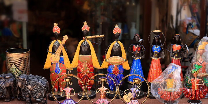 Close up view of colorful Rajasthan style traditional crafts up for sale.