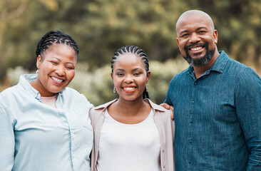 We could never have asked for a better daughter. a family relaxing together in their garden.