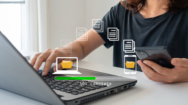 Transfer file concept. data transfer between Smartphone and Laptop. Data transfer file between folder, Backup data, Exchange of file. Virtual document loading to another folder. Streaming download.