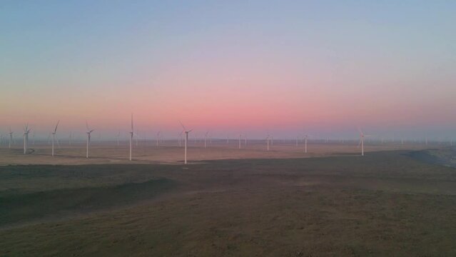 Aerial view of Wind turbines Energy Production. windmills at sunrise in Oregon