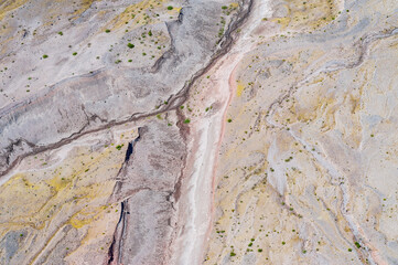 First-order stream channel erosion patterns on barren landscapes