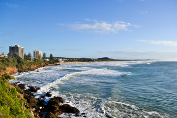 Fototapeta na wymiar Coastline with Surf Beach, Hills and Holiday Destinations at Coolum, Sunshine Coast, Queensland, Australia.