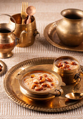 Famous Indian dessert semiya payasam or kheer topped with dry fruits and nuts