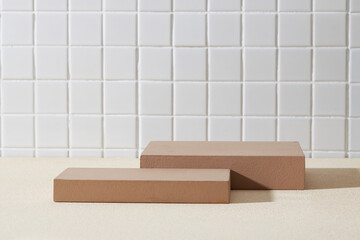 Two brown rectangle podiums with empty space for cosmetic product or goods presentation. Minimal...
