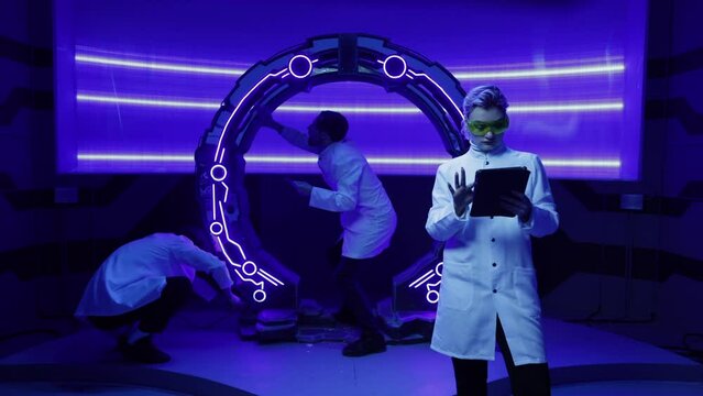 Technical engineers testing equipment in modern spaceship. Professional team of scientists in white uniform working futuristic interior. High quality 4k footage