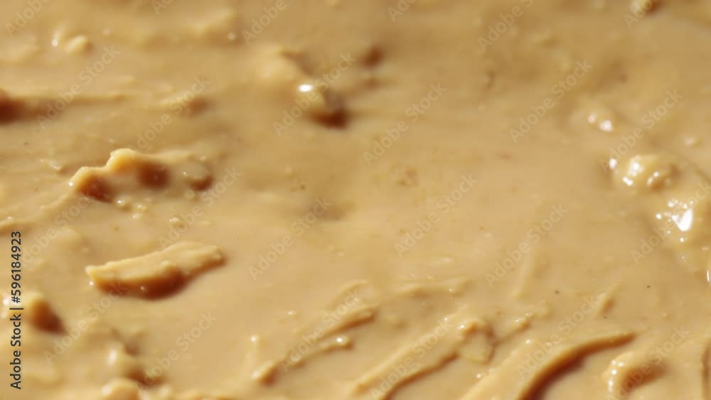 Poster peanut butter close-up rotates in a circle