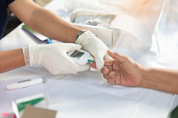 close up hand blood test