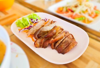 Roast pork Smoked Grilled Smoked Pork Chops Barbecue. Charcoal Grilled Pork Camping dish.