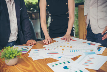 Fototapeta premium Business strategy team report chart, graph, infographic data analyze financial report plan. Hands team partner planning marketing finance statistics sale report with excel spreadsheet accountting