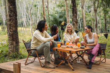 4 friends having a summer party in the nature, happy joyful moment