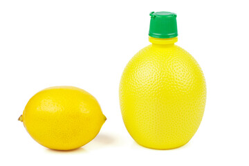 Lemon juice(condiments) in a bottle and lemon isolated on a white background
