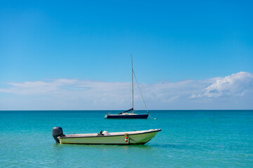 summer vacation boat. summer vacation boat at seascape. summer vacation boat at seaside. photo of summer vacation boat on the beach
