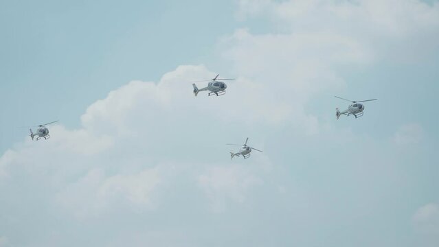 Jakarta, Indonesia - April 9, 2023: Indonesian Air Force (TNI AU) EC120B Colibri helicopter performs at the Indonesian Air Force's birthday event at Halim Perdana Kusuma