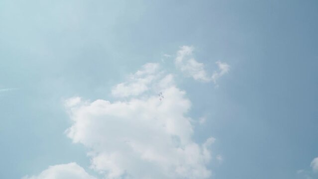 Jakarta, Indonesia - April 9, 2023: The Jupiter Aerobatic Team Squadron performs at the air show at Halim Perdanakusuma International Airport, during the 77th anniversary of TNI
