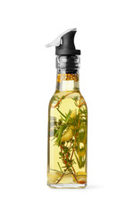 Glass bottle of cooking oil with spices and herbs isolated on white